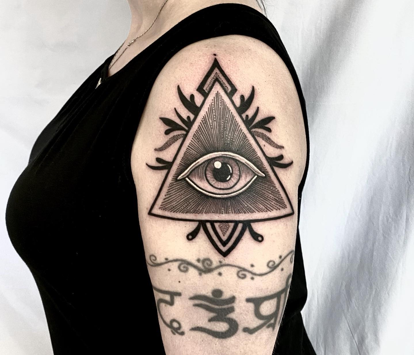 Hamsa evil eye tattoo